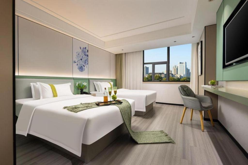 Kaibin International Hotel Csingtöcsen Kültér fotó